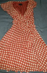 Orange and cream pokadot knee length dress